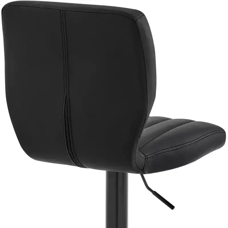 Sgabello regolabile con rivestimento in similpelle e finitura metallica